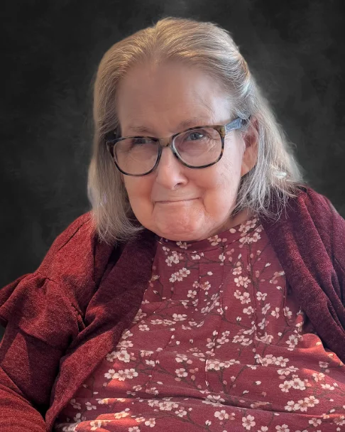 Patricia “Patsy” Grace FitzPatrick, smiling warmly in a studio portrait.